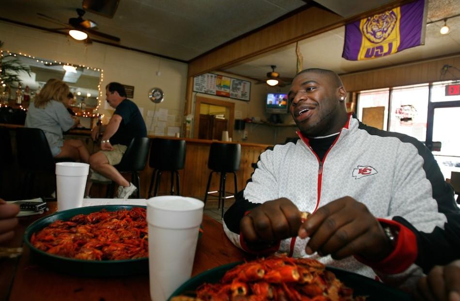 San Francisco 49er and Louisiana native Gienn Dorsey enjoys what he calls the best crawfish in Gonzales, Louisiana at the Seafood Corner.
