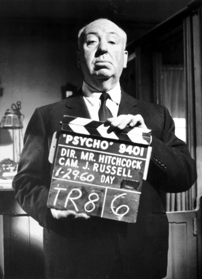 Alfred Hitchcock poses on the set of the 1960 horror classic Psycho.