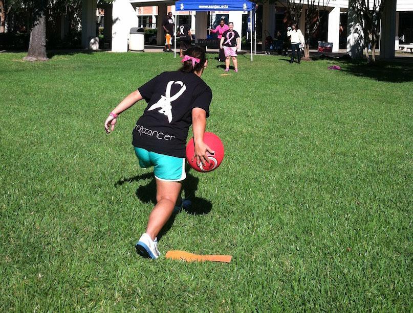 Hannah Hoffman (front) throws to Mary Shelley during last years cancer awareness event.