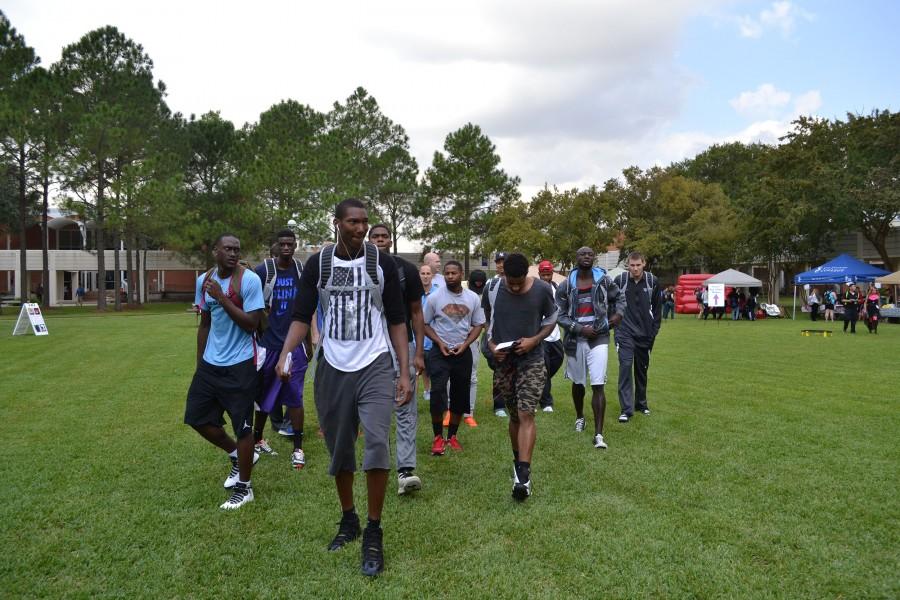 Ravens basketball players arrive at Central campus to kick off their upcoming season.