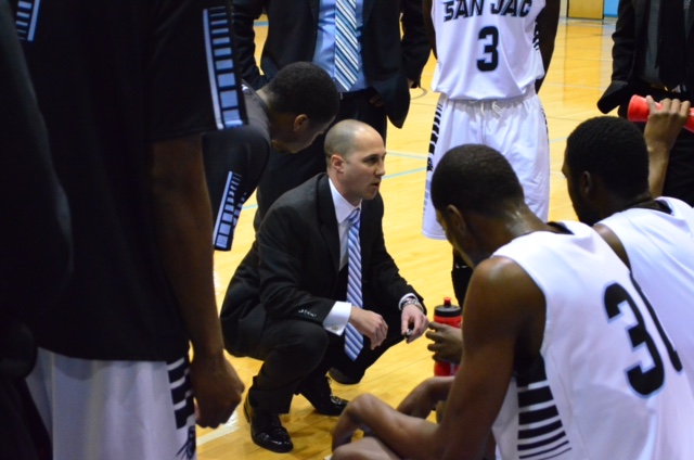 Head Coach Scott Gernander rallies his players during a game at Anders Gymnasium. The team currently averages a 3.02 GPA.