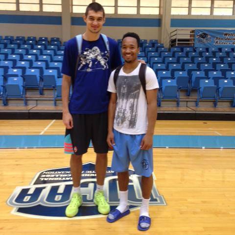 Seven-foot center Konstantin Kulikou (left) from Russia poses with roommate Elroi Butler from Israel. The teammates played together in Spain before coming to San Jac.

