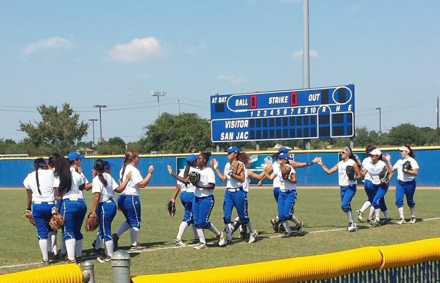 San Jac players high-five each other before taking the field Oct. 11 on the South campus.