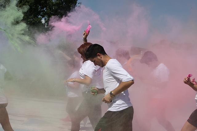 San Jac students throw packets of pink and green powder during the 2015 Color Out Cancer event put together by Rec Sports. The organization will take part in a 3.1-mile course featuring a race through multiple inflatable obstacles March 26 at the Pasadena Convention Center.

 