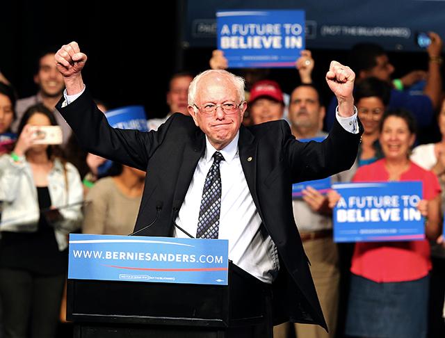 Democratic presidential candidate Sen. Bernie Sanders acknowledges his supporters during a campaign event in Miami at the James L. Knight Center on Tuesday, March 8, 2016. 