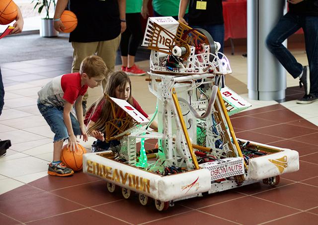 The ‘basketball robot’ designed by the Clear Creek Independent School District Robotics Club was a slam dunk with children attending NASA Space Science Day on the South campus April 14. 
