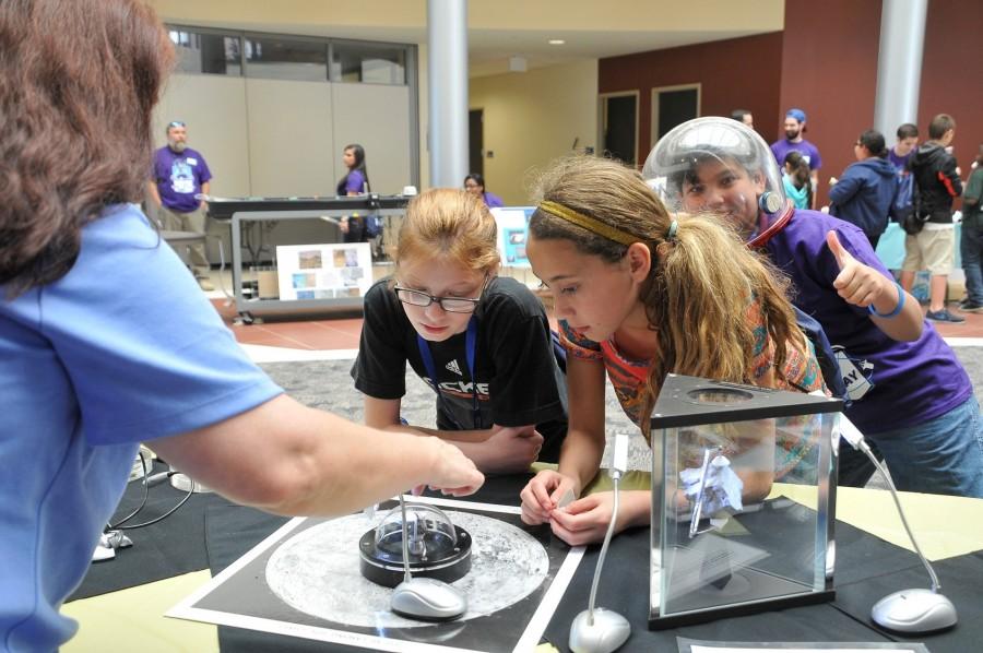 Students from Odyssey Academy enjoy a demonstration during NSSD in 2015.
