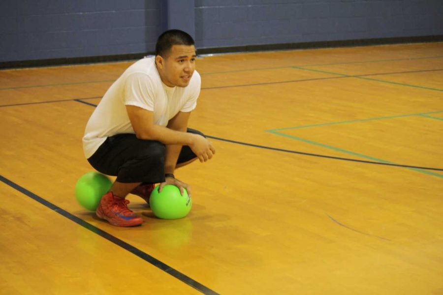 Student worker Jonathan Ortiz enjoys a fun game of Dodgeball in 2013. The activity was canceled the last few semesters due to low participation, but will be open for registration once again on Oct. 24.
