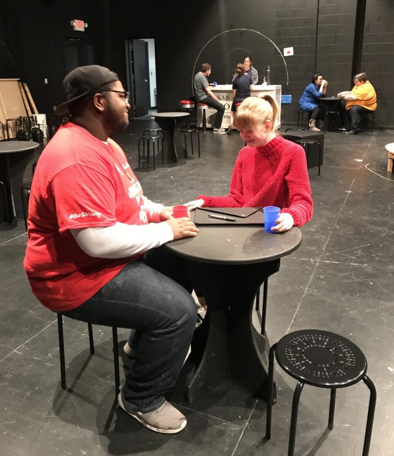 Tyundre Caple (left) and Maggie Habermas rehearse a scene from ‘The Anaconda Lounge.’