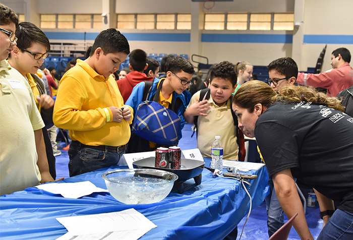 Houston area sixth graders attend last year’s Mind Trekkers: Adventures in Stem, where they are fascinated by experiments and demonstrations known as STEMonstrations.   